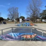 Mural painted on the side of skateboarding ramps