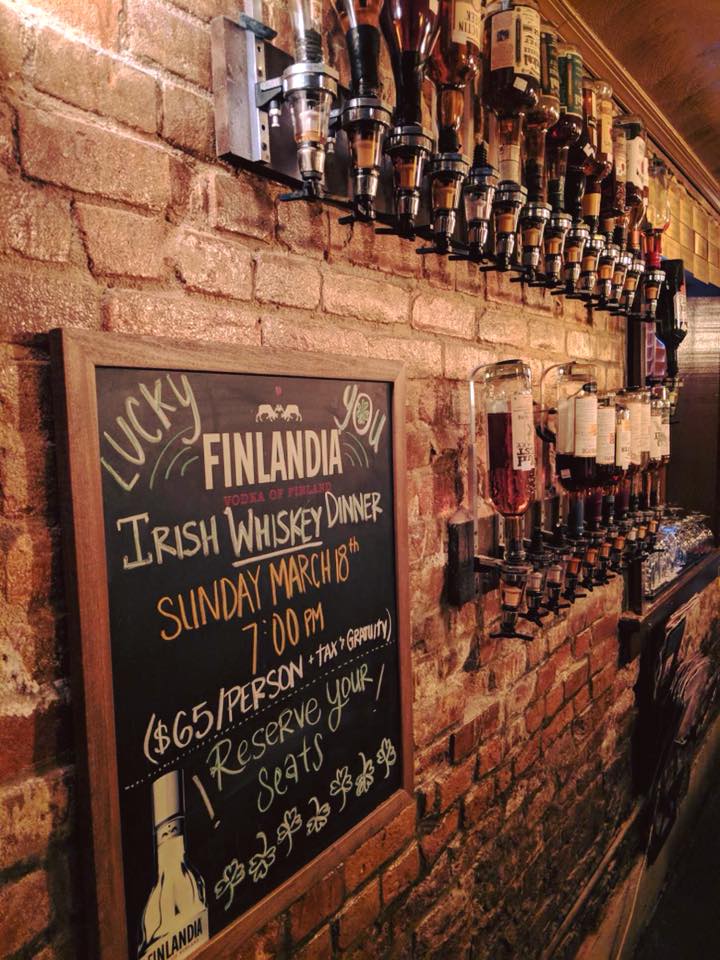 Whiskey wall in Still Worldly Eclectic Tapas in Portsmouth, Virginia Whiskey wall in Still Worldly Eclectic Tapas in Portsmouth, Virginia