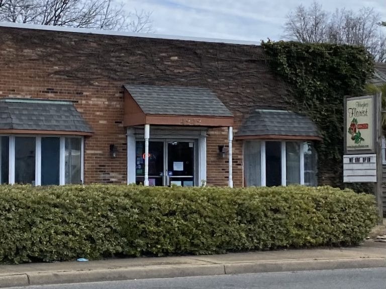 Street view of the entrance of Hughes Florist in Portsmouth, Virginia