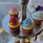 Cupcakes on a tiered display table 