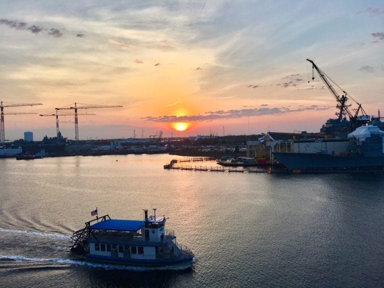 The Elizabeth River Ferry sailing as the sun sets. The Elizabeth River Ferry sailing as the sun sets.
