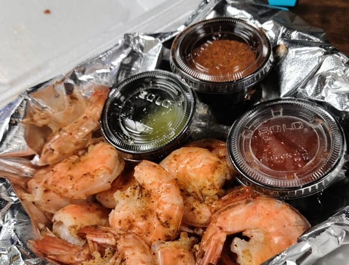 A basket of unpeeled shrimp at Two Up Two Down in Portsmouth, Virginia