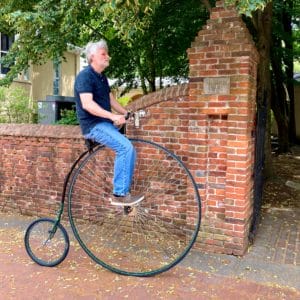 A man Penny Farthing in Olde Towne Portsmouth Virginia