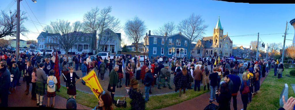 A large group of people participating in Portsmouth's Olde Towne Scottish Walk