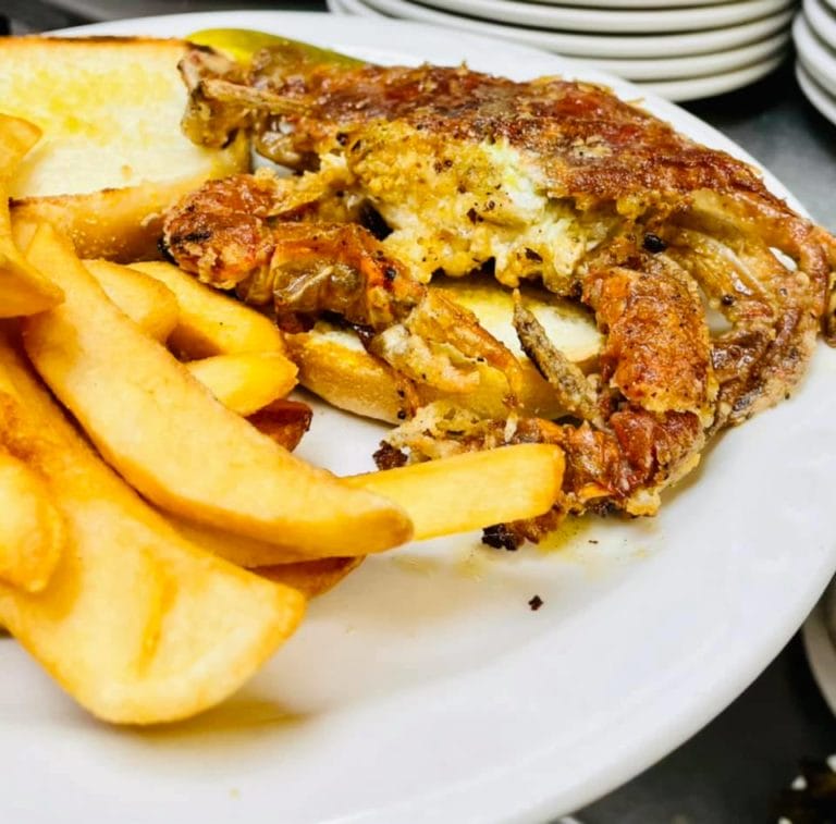 Soft shell crab sandwich and fries served at Lobscouser in Portsmouth, Virginia Soft shell crab sandwich and fries served at Lobscouser in Portsmouth, Virginia