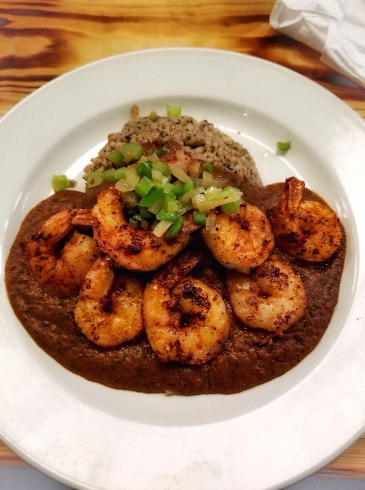 Seasoned shrimp and rice served at Olde Towne Public House in Portsmouth, Virginia Seasoned shrimp and rice served at Olde Towne Public House in Portsmouth, Virginia