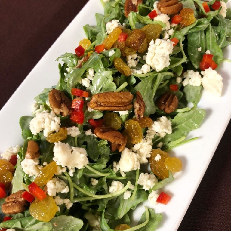 A fresh salad served at Still Worldly Eclectic Tapas in Portsmouth, Virginia A fresh salad served at Still Worldly Eclectic Tapas in Portsmouth, Virginia