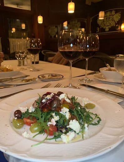 A salad paired with red wine at Café Europa in Portsmouth, Virginia