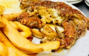 A plate of soft shell crab and fries