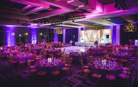 Banquet hall with tables and a dance floor inside the Rivers Casino in Portsmouth, Virginia.