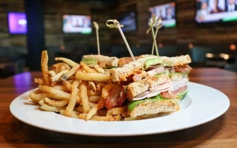 A turkey sandwich and fries on a plate inside Crossings Cafe in Rivers Casino in Portsmouth, Virginia.