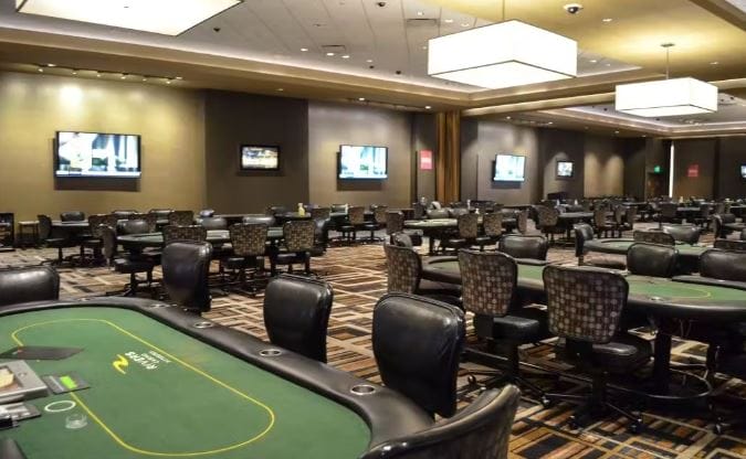 Empty poker tables inside the Rivers Casino in Portsmouth, Virginia.