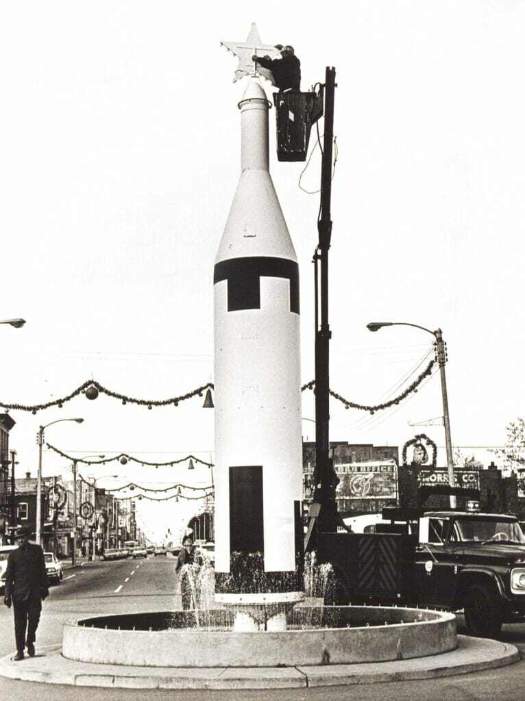 A man decorating a rocket on High Street in Portsmouth, Virginia 