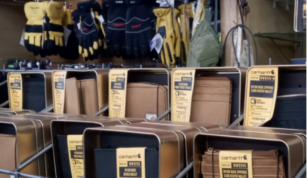 Image of a shelf full of Carhart wallets