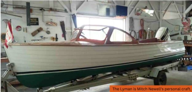 Lyman wooden boat fully restorie sitting atop trailer