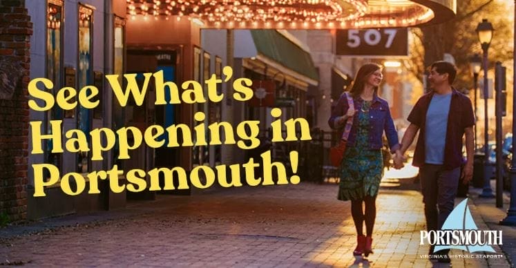 couple walking past a historic theatre in Olde Towne, Portsmouth, Va